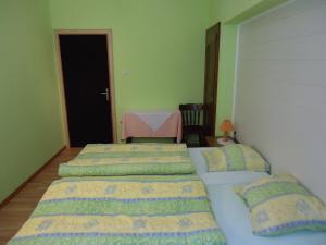 Postel nebo postele na pokoji v ubytování Hostellerie de la Vallée