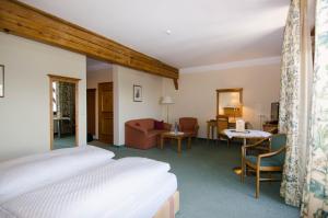 Postel nebo postele na pokoji v ubytování Hotel Ansitz Kematen ***S