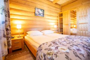 Postel nebo postele na pokoji v ubytování Dzintarkrasts + 37 fotografií
