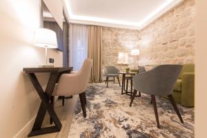Posezení v ubytování Heritage Hotel Leon Coronato