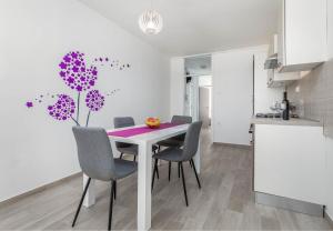 Kuchyň nebo kuchyňský kout v ubytování Apartment Sole + 23 fotografií