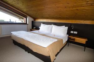 Postel nebo postele na pokoji v ubytování Hotel Ansitz Kematen ***S