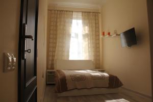 Posteľ alebo postele v izbe v ubytovaní Jurincom apartments