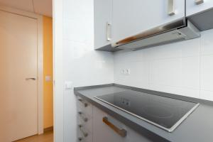 Kuchyňa alebo kuchynka v ubytovaní Housalia Guell & Gracia