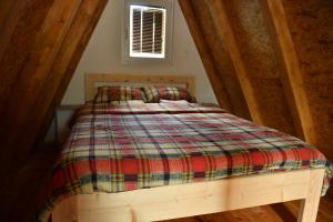 Postel nebo postele na pokoji v ubytování B&B Konak