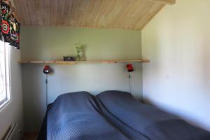 Postel nebo postele na pokoji v ubytování Café Björnen + 5 fotografií