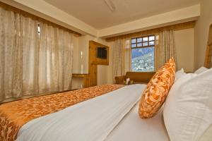 Postelja oz. postelje v sobi nastanitve Hotel Hayer Regency