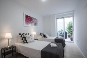 Posteľ alebo postele v izbe v ubytovaní Stylish *NEW* Apartment in Alicante w/ 4 bedrooms