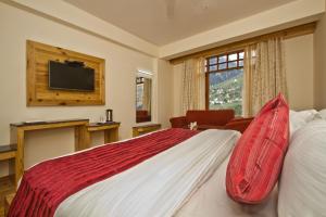 Postelja oz. postelje v sobi nastanitve Hotel Hayer Regency