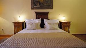 Postel nebo postele na pokoji v ubytování Grand Hotel Praha