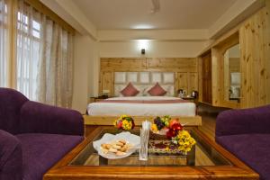 Postelja oz. postelje v sobi nastanitve Hotel Hayer Regency