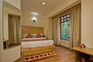Postelja oz. postelje v sobi nastanitve Hotel Hayer Regency