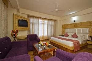 Postelja oz. postelje v sobi nastanitve Hotel Hayer Regency