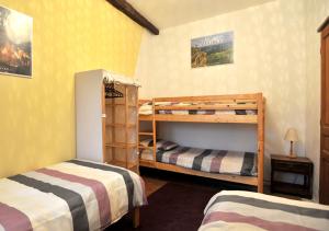 Postel nebo postele na pokoji v ubytování Gîte le Fort