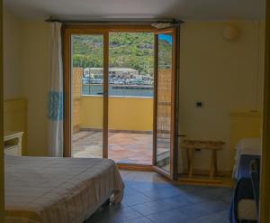 Postel nebo postele na pokoji v ubytování Hotel Baja Romantica