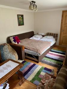 Ліжко або ліжка в номері Апартаменты PAROSTKI