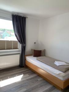 Letto o letti in una camera di Hotel Bannewitz B&B