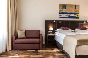 Posteľ alebo postele v izbe v ubytovaní Hotel Sandwirth