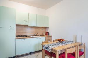 A kitchen or kitchenette at Residence Nuove Terme