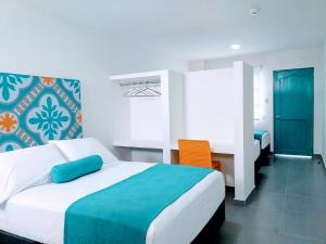 Postel nebo postele na pokoji v ubytování Akuamarina Hotel + 37 fotografií