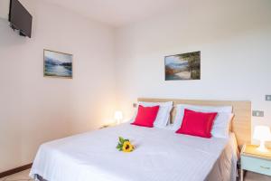 A bed or beds in a room at Residence Nuove Terme