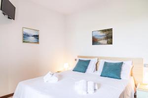 A bed or beds in a room at Residence Nuove Terme