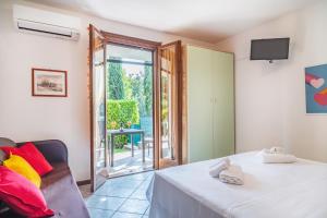 A bed or beds in a room at Residence Nuove Terme