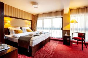 Posteľ alebo postele v izbe v ubytovaní Hotel Wielopole