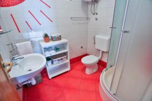 Koupelna v ubytování Apartments Trešnja