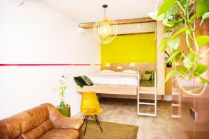 Postel nebo postele na pokoji v ubytování Hotel Bruno