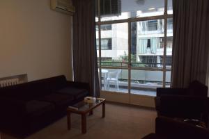 Posezení v ubytování Adonis Furnished Suites