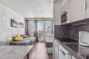 Kuchyň nebo kuchyňský kout v ubytování Residences Quartier Falaise - maeva Home