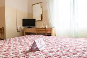 Postel nebo postele na pokoji v ubytování Villa Rosy