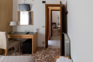 Postel nebo postele na pokoji v ubytování Villa Rosy