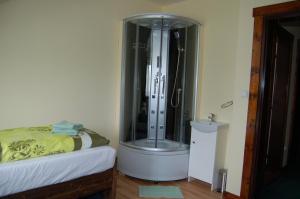 Postel nebo postele na pokoji v ubytování Hotel Pudlov