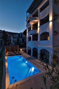 an image of a building with a swimming pool at Casa Mia in Budva