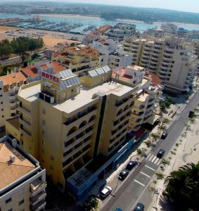 an aerial view of a city with buildings at Hotel Santa Catarina Algarve in Portimão