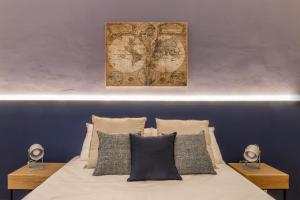 Posteľ alebo postele v izbe v ubytovaní Elegante appartamento da 6 Blu&Oro