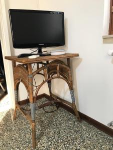 TV a/nebo společenská místnost v ubytování Casetta Rosada
