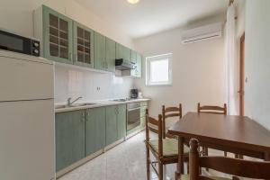Køkken eller tekøkken på Apartman Burčul