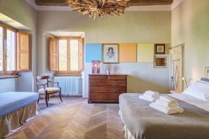 Postel nebo postele na pokoji v ubytování Palazzo Gatteschi + 37 fotografií