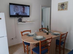 TV a/nebo společenská místnost v ubytování Apartment Fortuna