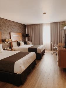Katil atau katil-katil dalam bilik di Hotel Mercury Inn