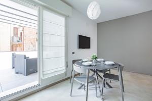 Televízia a/alebo spoločenská miestnosť v ubytovaní C-Apartment Zabarella terrace