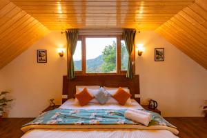 Postel nebo postele na pokoji v ubytování Zostel Homes Theog (Shimla)