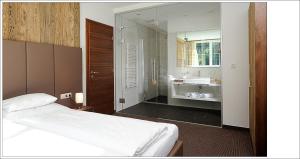 Letto o letti in una camera di Alpenstern - Sommer Silvretta Card Premium inklusive!