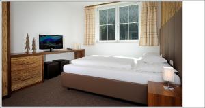 Letto o letti in una camera di Alpenstern - Sommer Silvretta Card Premium inklusive!