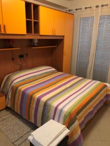 A bed or beds in a room at Alle Torri