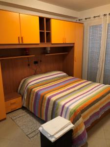 A bed or beds in a room at Alle Torri