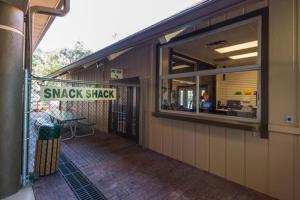 a snack shack sign on the side of a building at Lehigh Resort Club, a VRI resort in Lehigh Acres